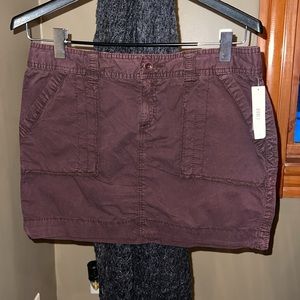 Brown micro mini Jean style skirt. cute with deep front and back pockets NWT